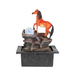 Decorative fountain with a horse figure and glowing crystal ball on a white background