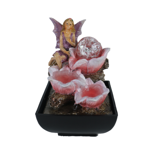 Decorative fairy garden with a fairy, flowers, and a crystal ball on a white background