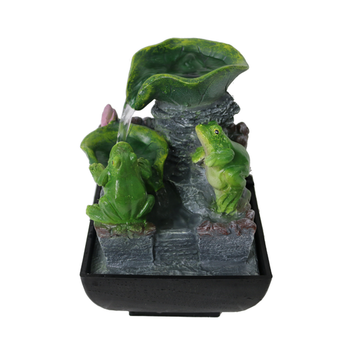 Decorative water fountain with frogs and a leaf on a white background