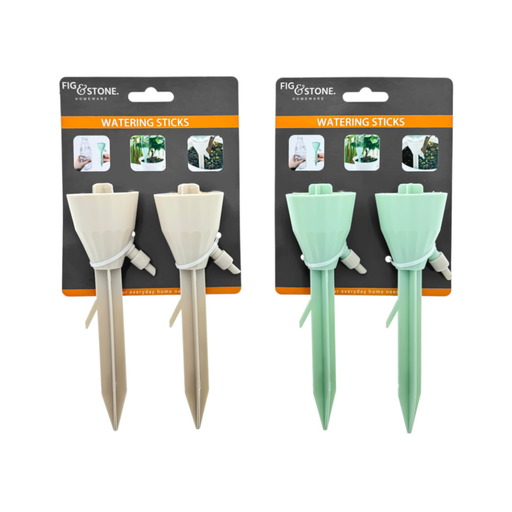 Two packages of Fig & Stone watering sticks, one beige and one green, on a white background.