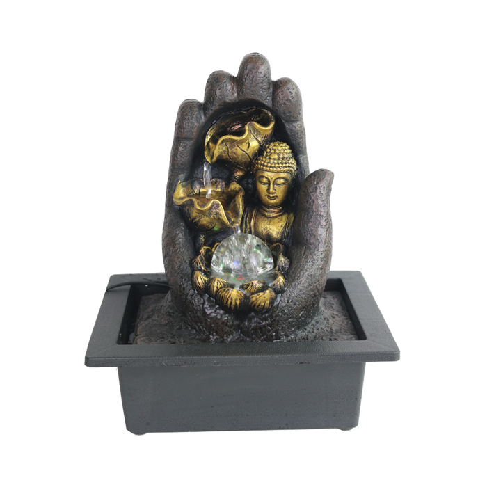Decorative fountain with Buddha figure and crystal ball inside a palm-shaped sculpture on a white background.