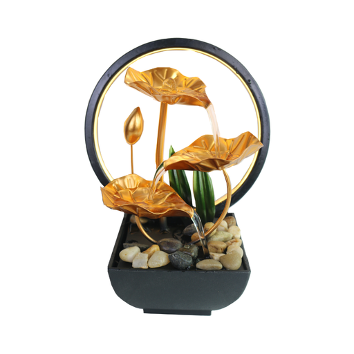 Decorative water fountain with gold leaf design on a white background