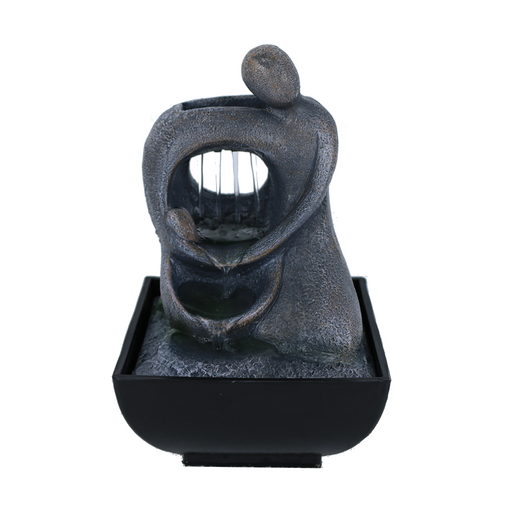 A Zen-inspired water feature with a figure that resembles a person's upper body and head, with water flowing down their back into a black basin.