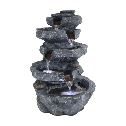 A modern Zen-inspired water feature with tiered rocks and a gentle flow of water, featuring sleek, contemporary design.