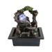 Decorative water fountain with LED light on a white background